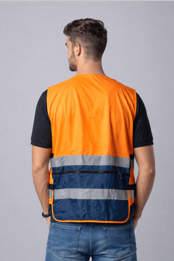 וסט עבודה כתום זוהר עם כיסים